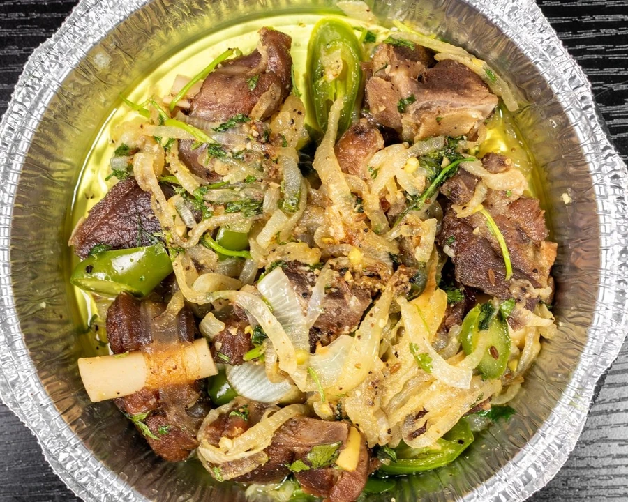 Afghani do pyaza lamb in onion sauce at Afghan Chatkhara Restaurant, Calgary NE