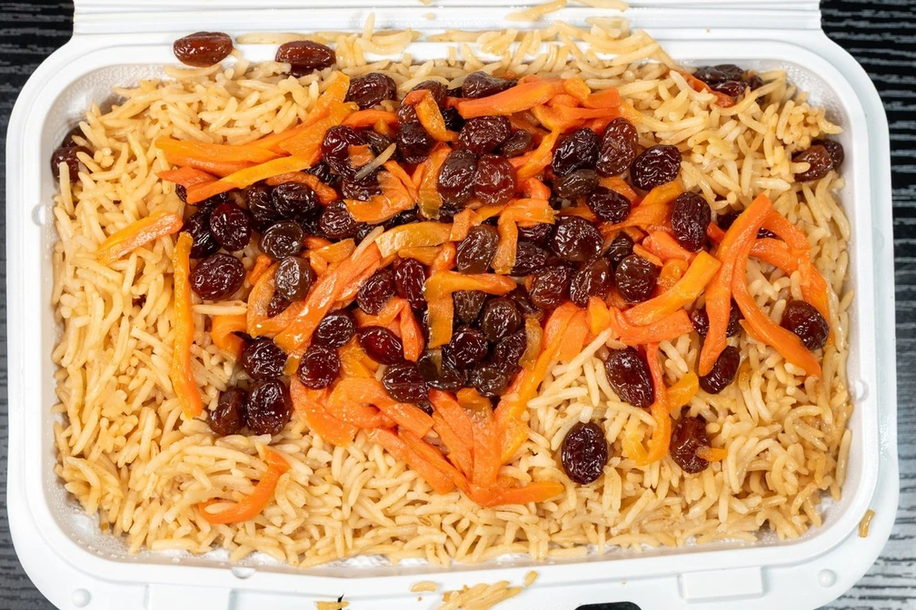 Qabuli pulao with raisins and carrots at Afghan Chatkhara Restaurant, Calgary NE
